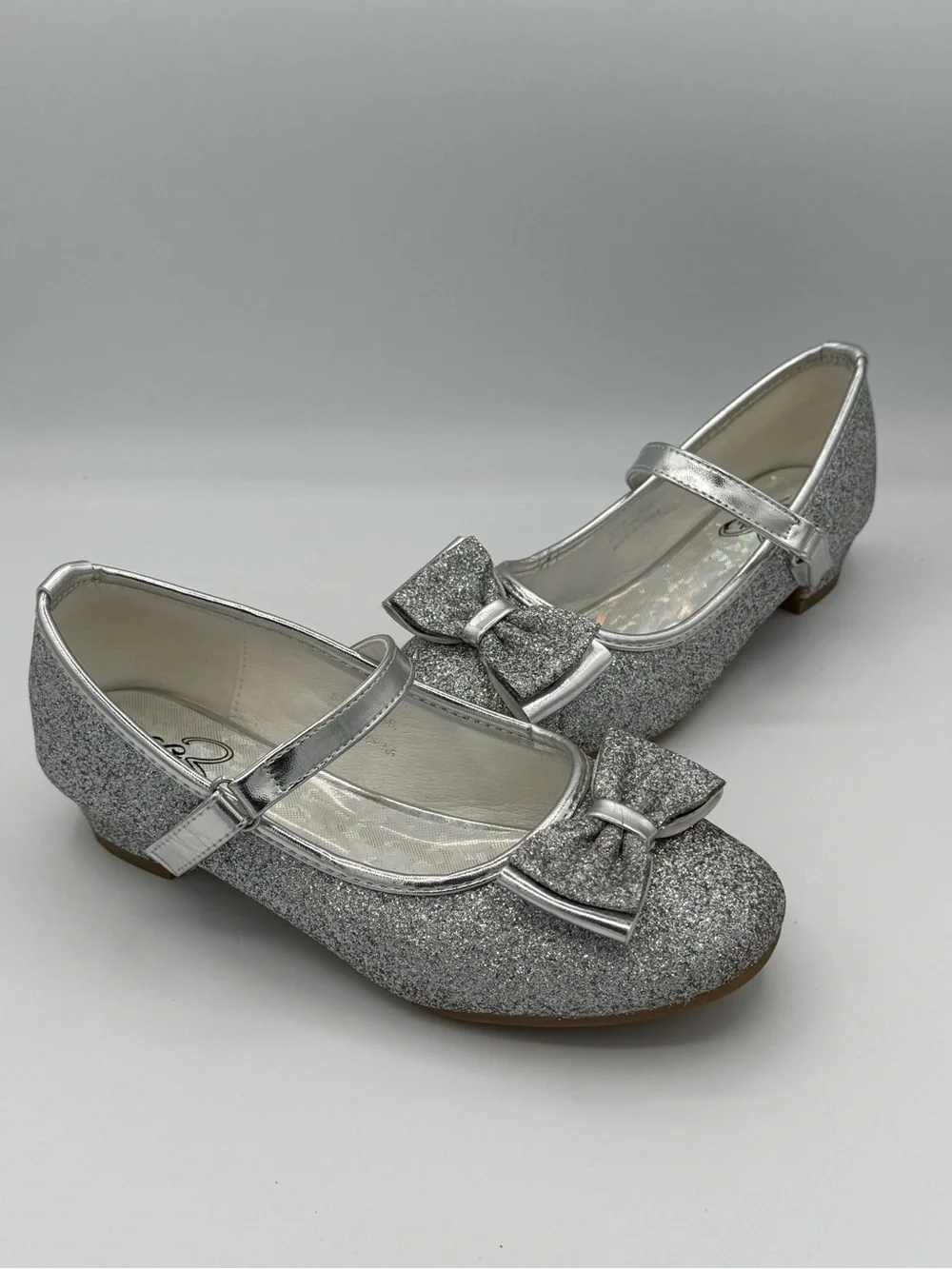 Stelle Mary Jane Silver Glitter Shoes with Prominent Bow